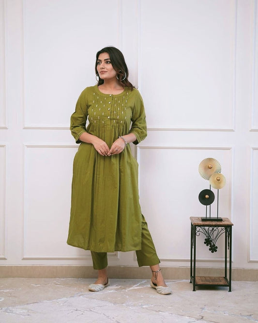 Manual Tagai and Button work Kurti set